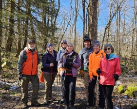 Skiers hiking on Feb 4, no snow