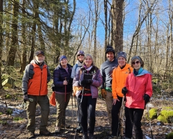 Skiers hiking on Feb 4, no snow